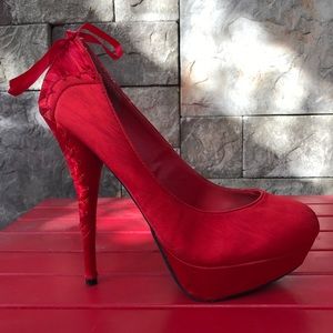 Red 6 inch pumps with corset lace up detail